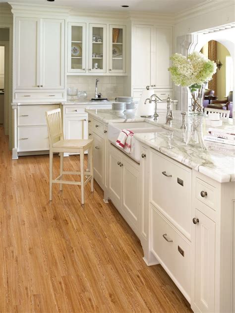 white kitchen cabinets wood floor